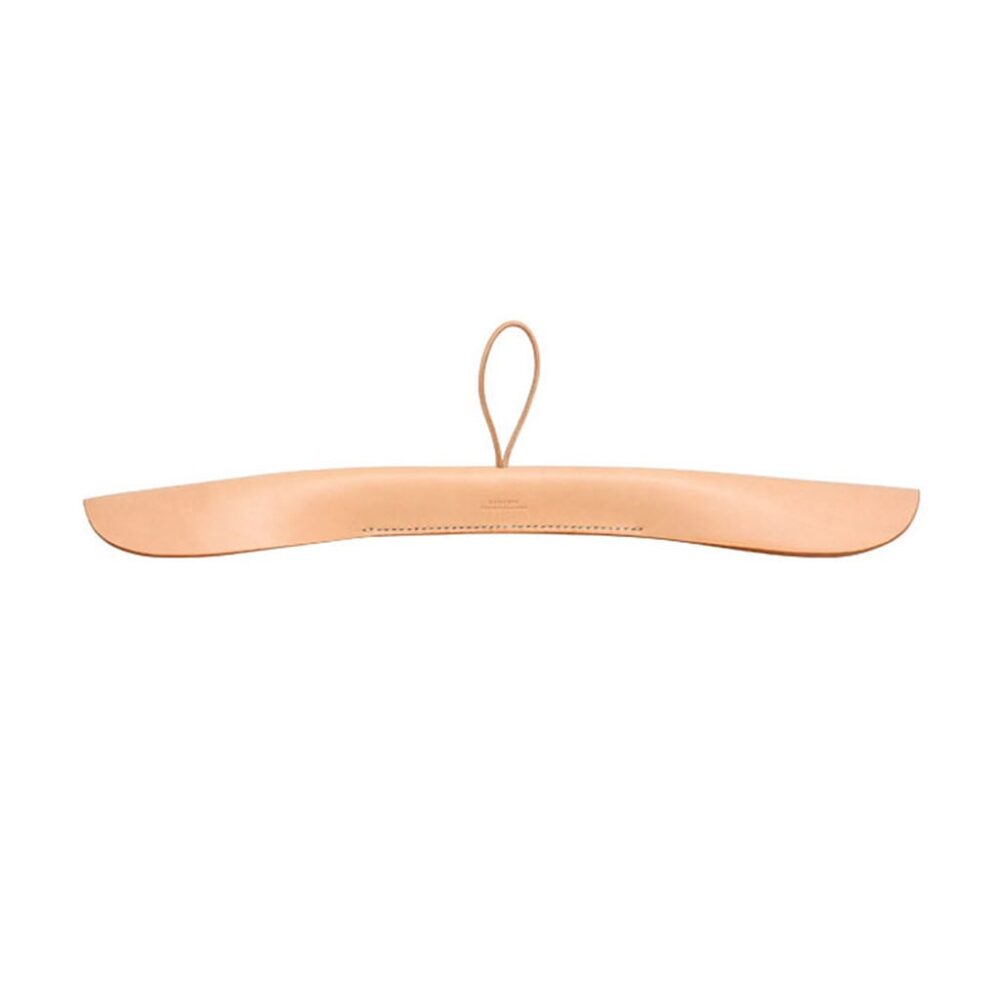 A minimalist leather clothes hanger with a smooth, curved design and a loop at the top for hanging.